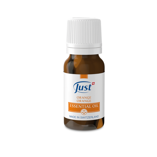 Orange Essential Oil bottle with citrus fruit background uplifting natural essential oil for mood and energy